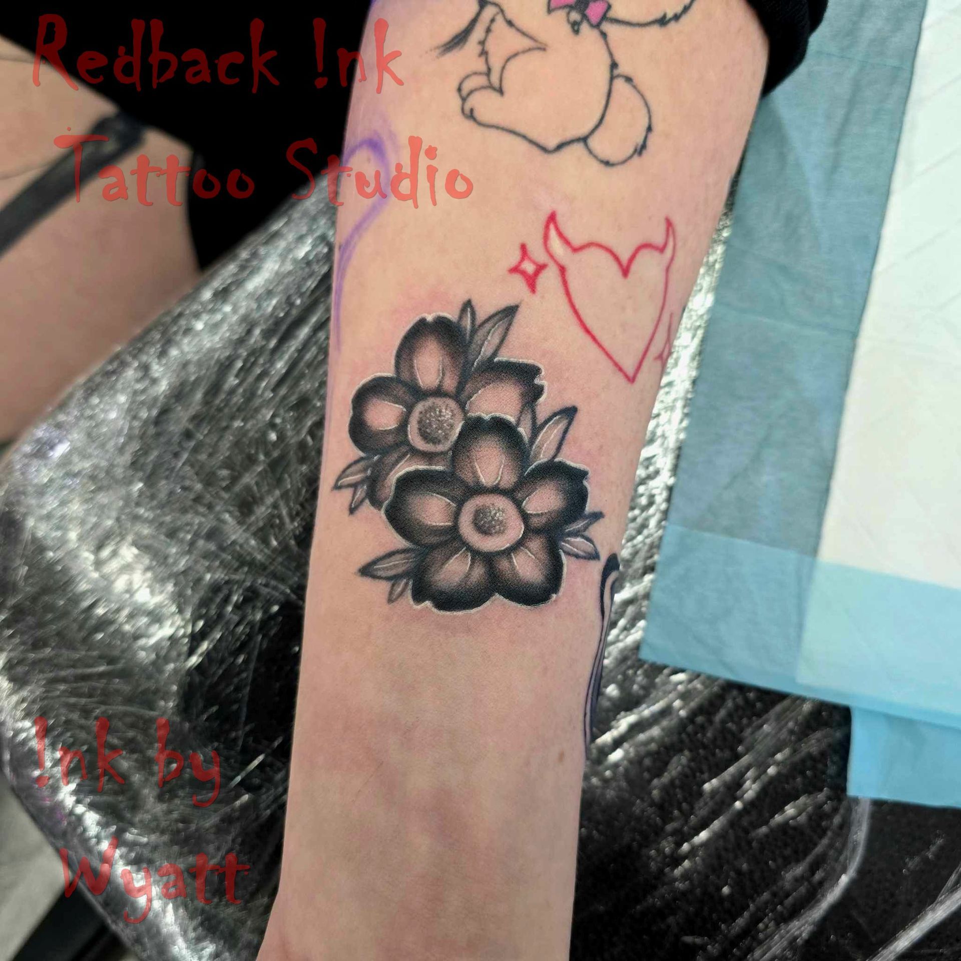 Black and Gray Floral Tattoo on a Person's Arm — Redback !nk Tattoo Studio in Kawana, QLD
