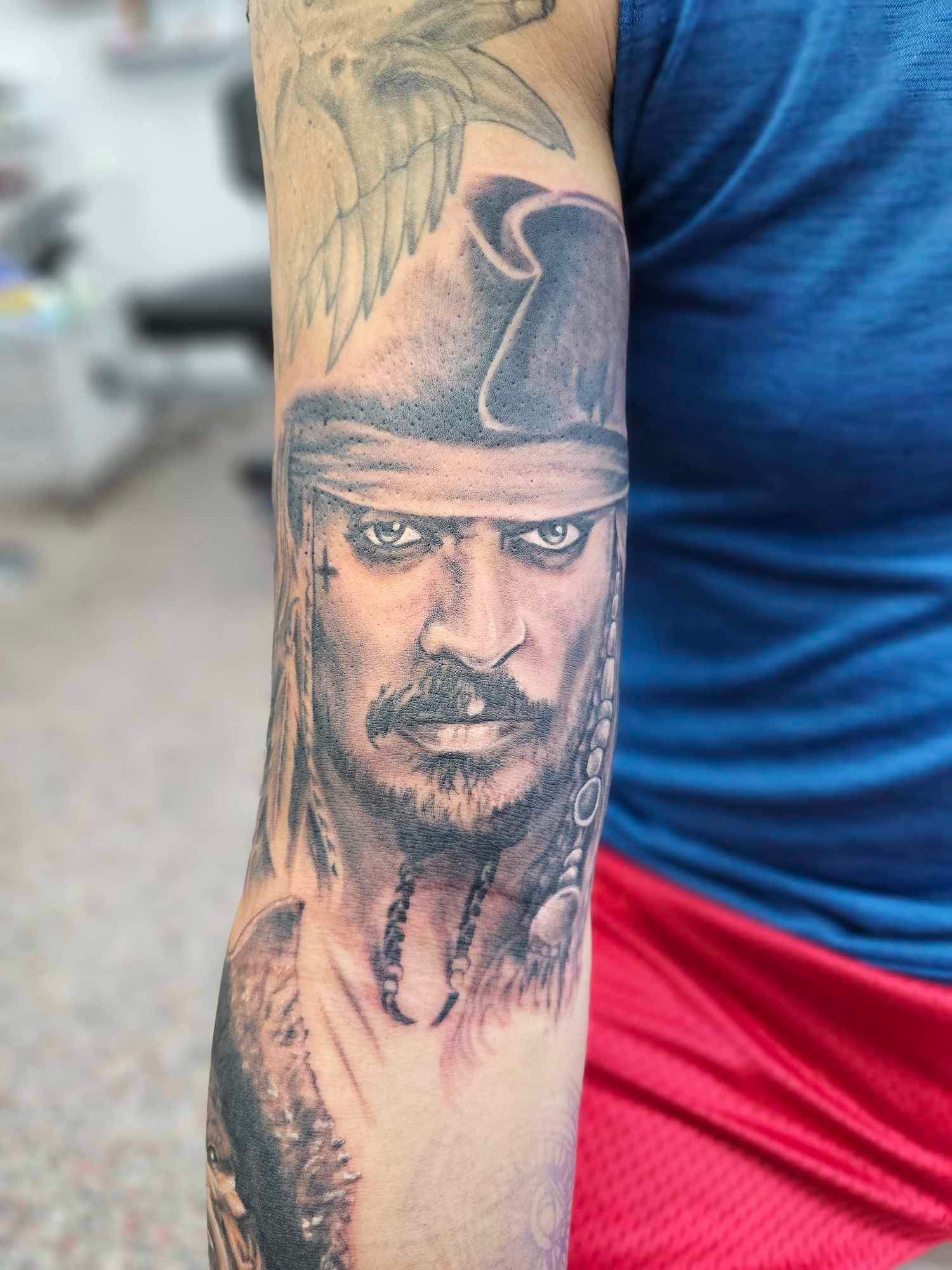 Black and White Tattoo of Jack Sparrow From Pirates of the Caribbean — Redback !nk Tattoo Studio in Kawana, QLD
