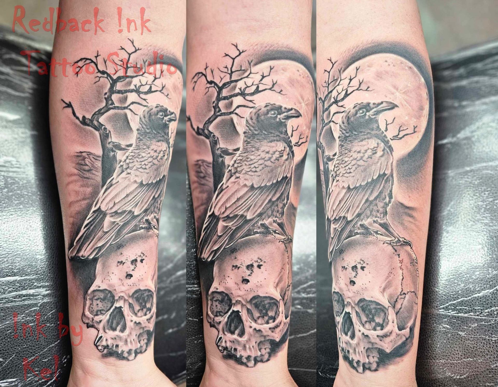 Tattoo on forearm: crow perched on skull, barren tree, full moon backdrop. Black and gray.