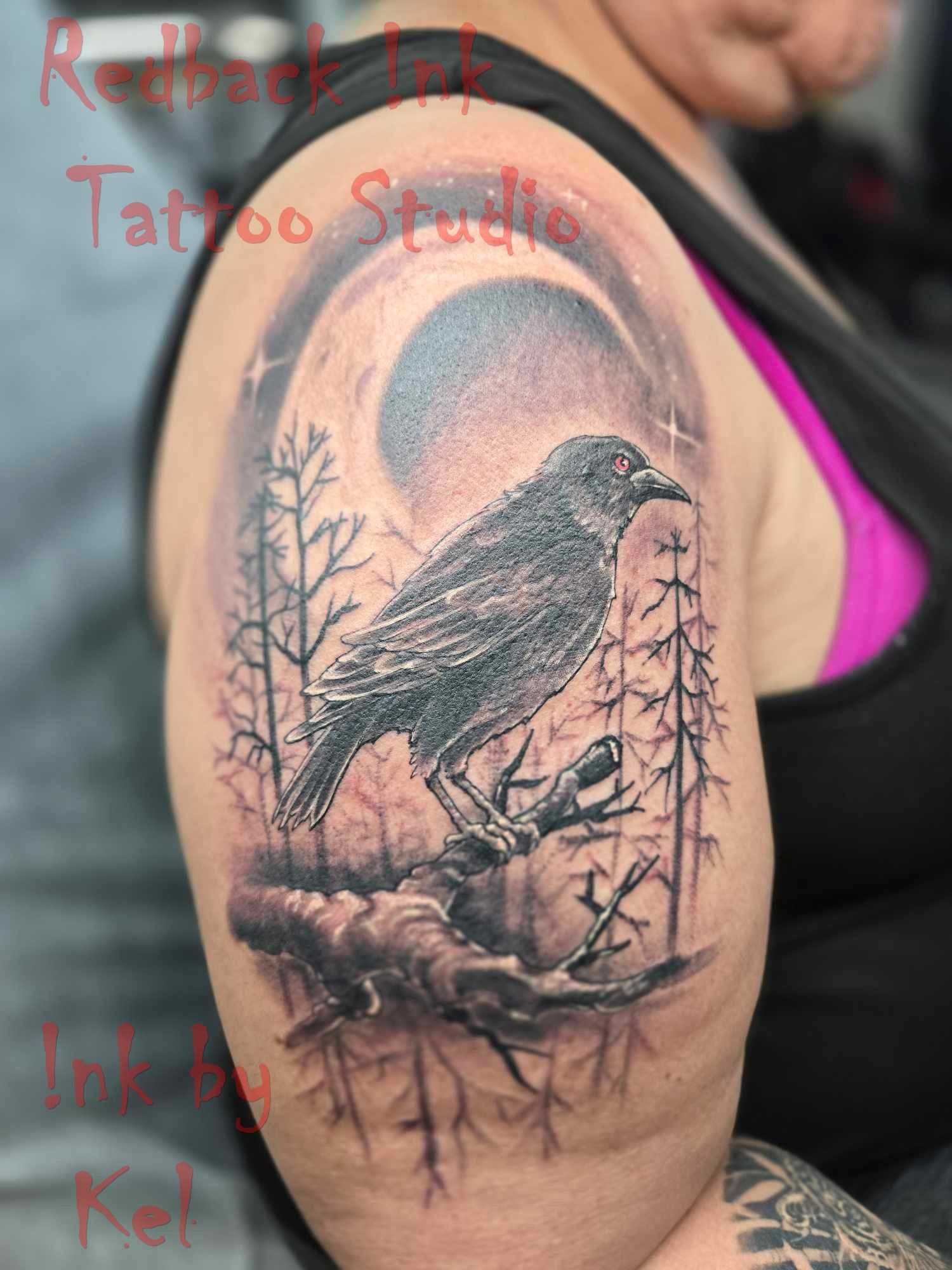 Black and gray tattoo of a bird perched on a branch, set in a forest under a crescent moon and stars. — Redback !nk Tattoo Studio in Kawana, QLD