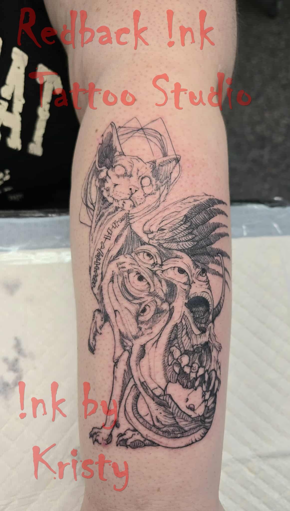 Black tattoo on arm: cat-like creature with large open mouth, detailed dot work — Redback !nk Tattoo Studio in Kawana, QLD