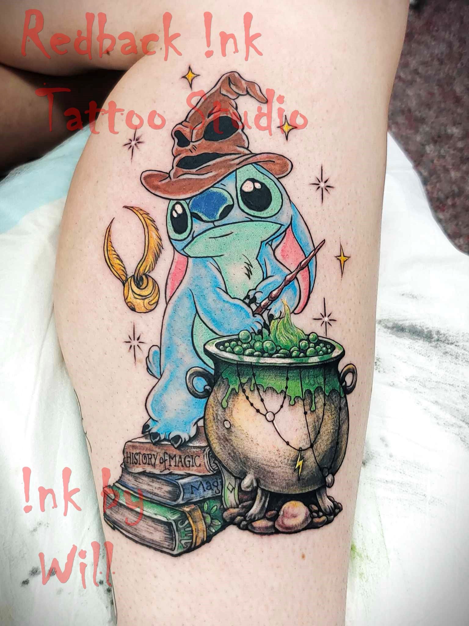 Stitch in a Sorting Hat, brewing a potion. Tattoo on leg, with books, cauldron, and Golden Snitch.
