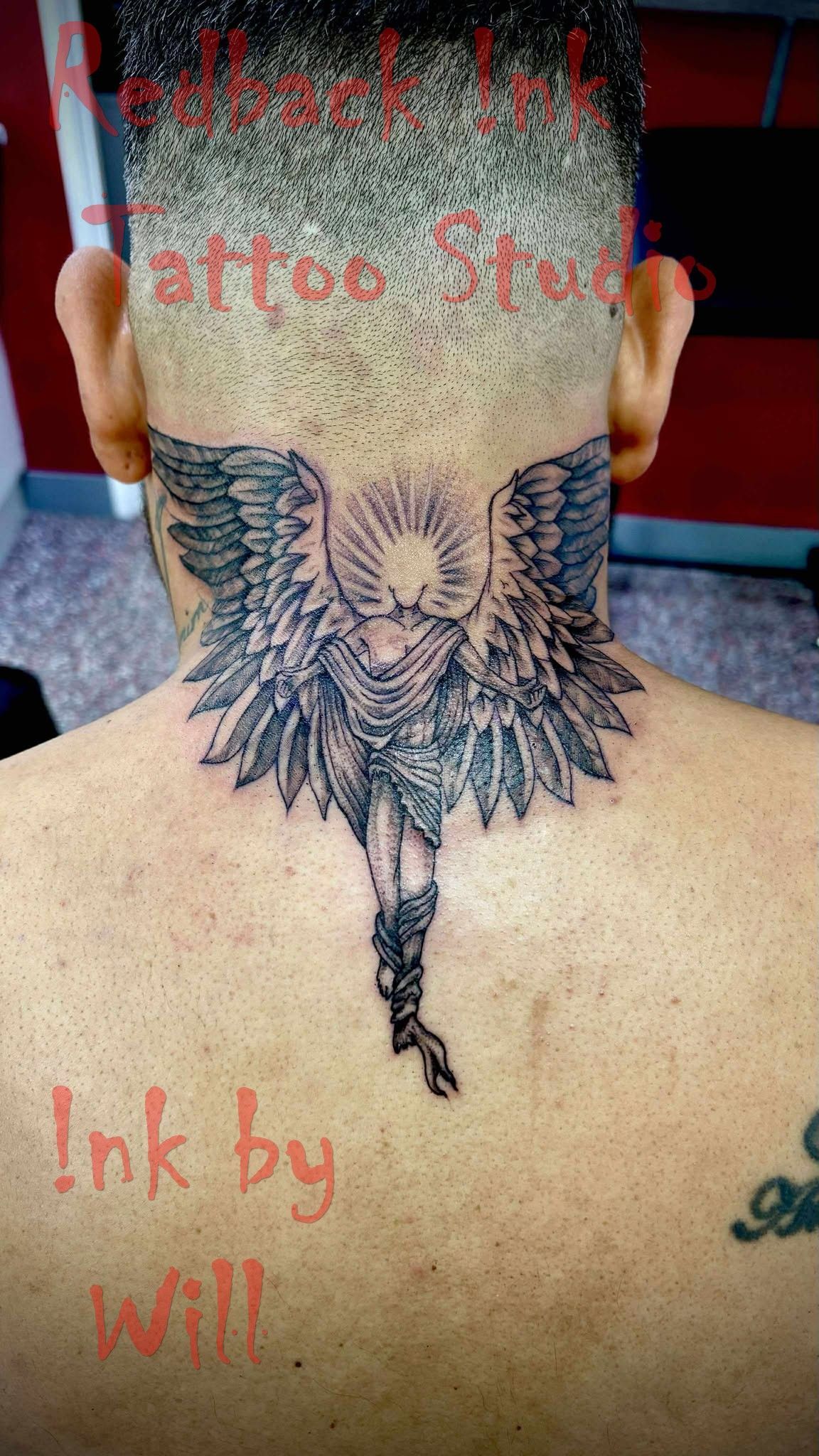 Tattoo of an angel with outstretched wings on a person's neck and upper back; black ink.