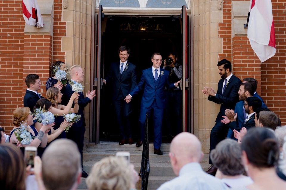Pete Buttigieg, left, and Chasten Glezman after their wedding last year in South Bend, Ind.Credit...Lyndon French for The New York Times