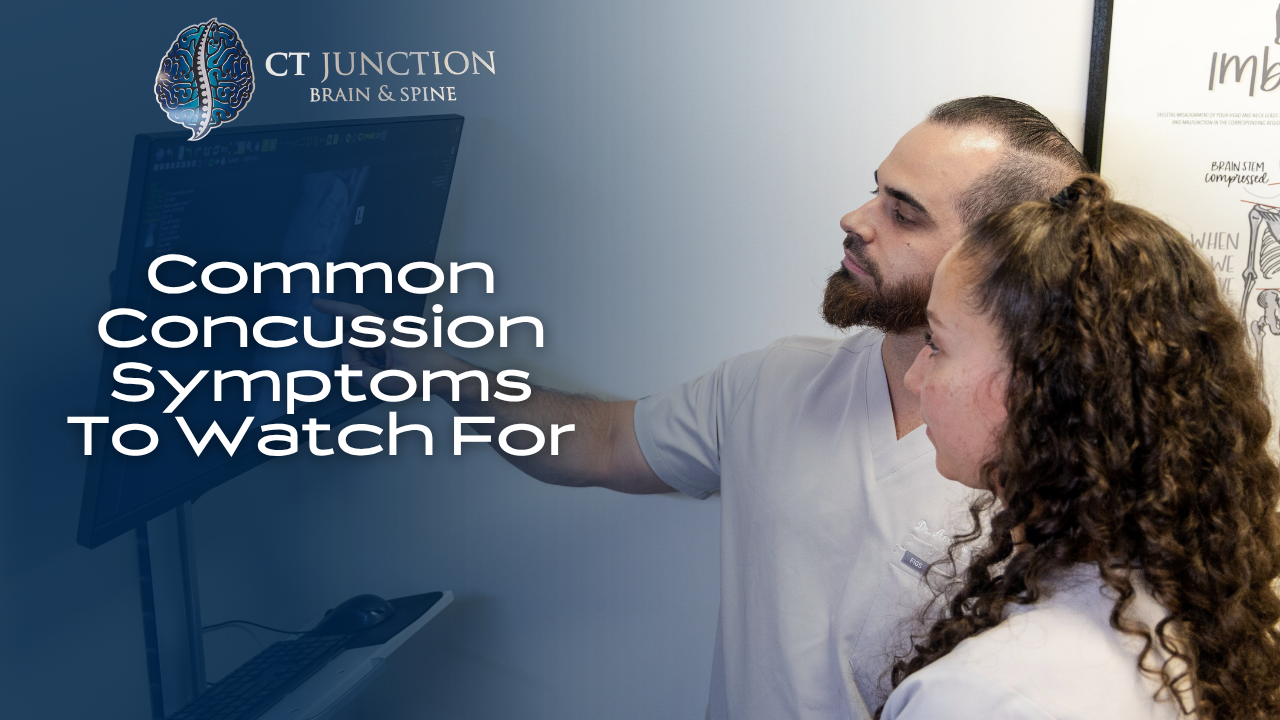 Two clinicians in a medical setting review a brain scan on a monitor next to the text 