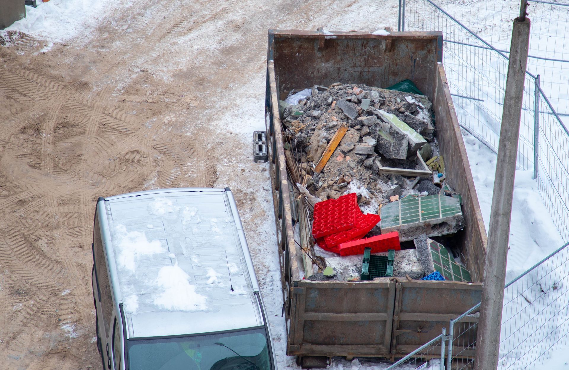 A truck filled with construction debris.