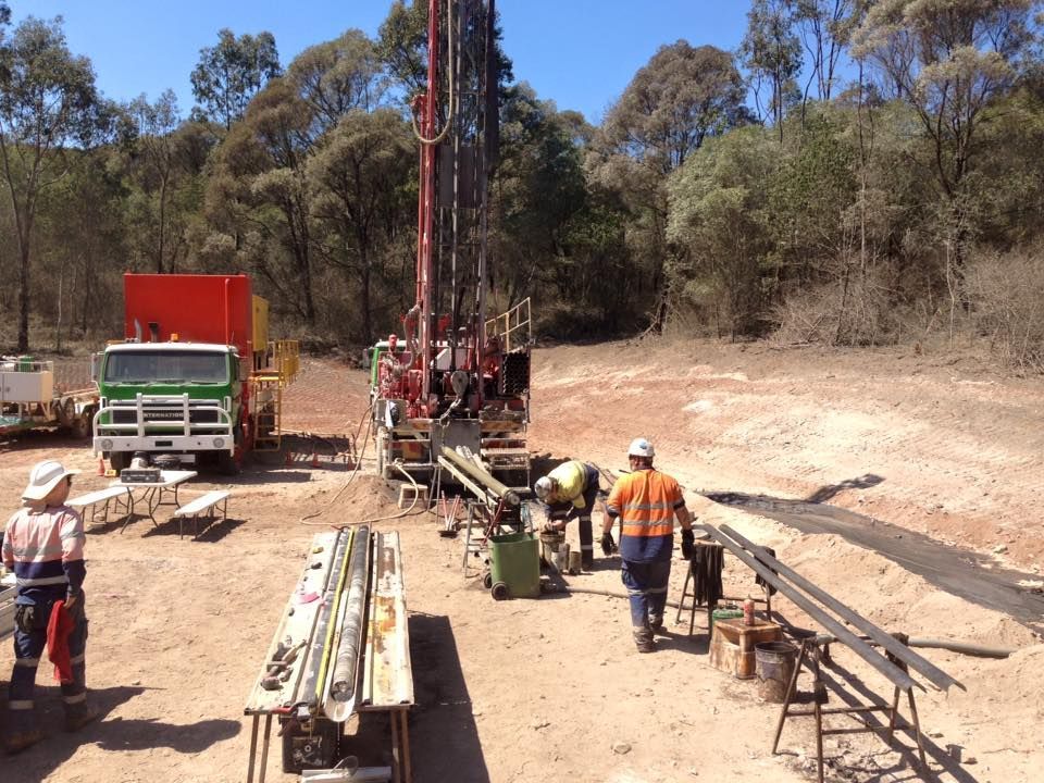 A Drill is Being Used to Drill a Hole in the Ground at a Construction Site — Kowaltzke Drilling Services in Gatton, QLD