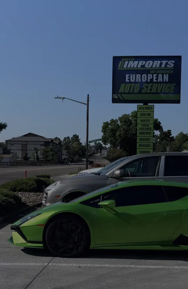 Green car parked outside | AutoImports of Denver