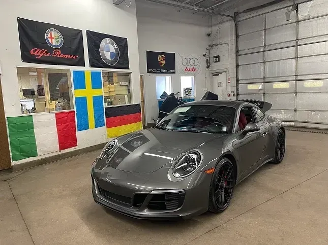 Gray car parked inside of our garage | AutoImports of Denver