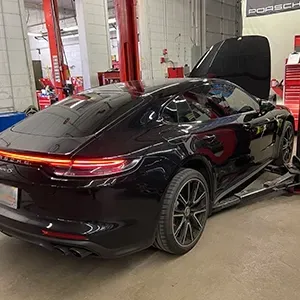 Side view of black car | AutoImports of Denver