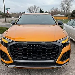 Front of orange vehicle | AutoImports of Denver