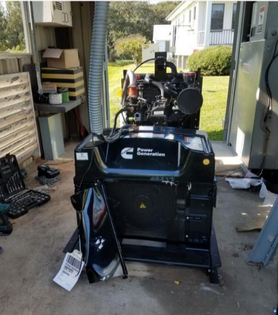 A black machine with the letter c on it