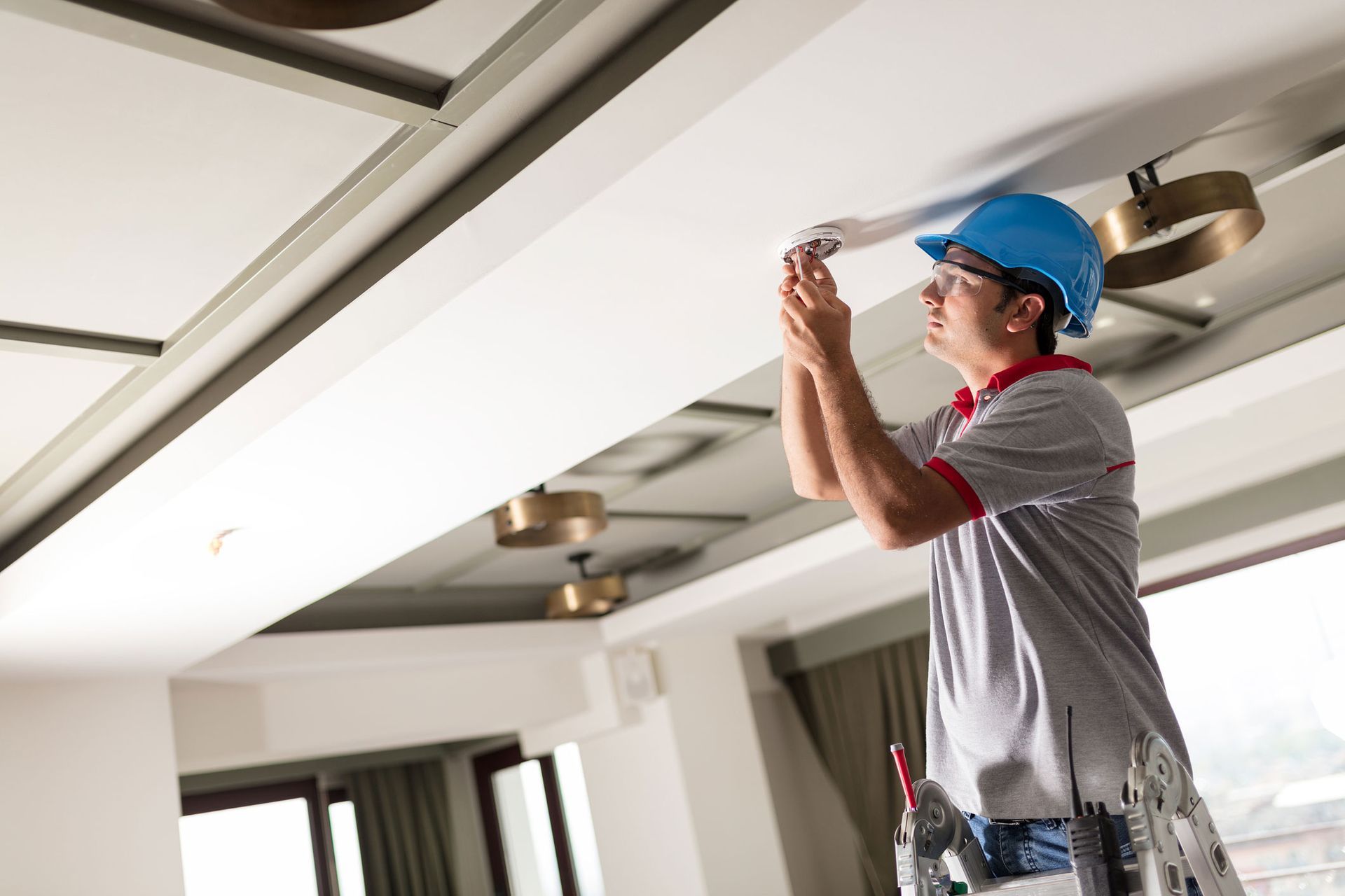 Man Installing Smoke Detector — Newark, DE — Allegiant Fire Protection