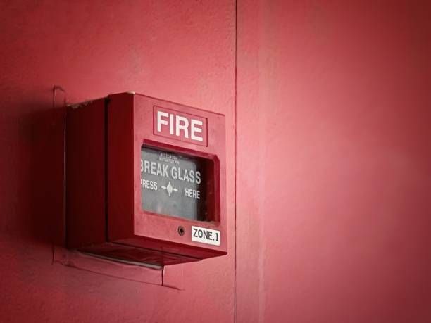 A red color Fire Break Glass panel for emergency use