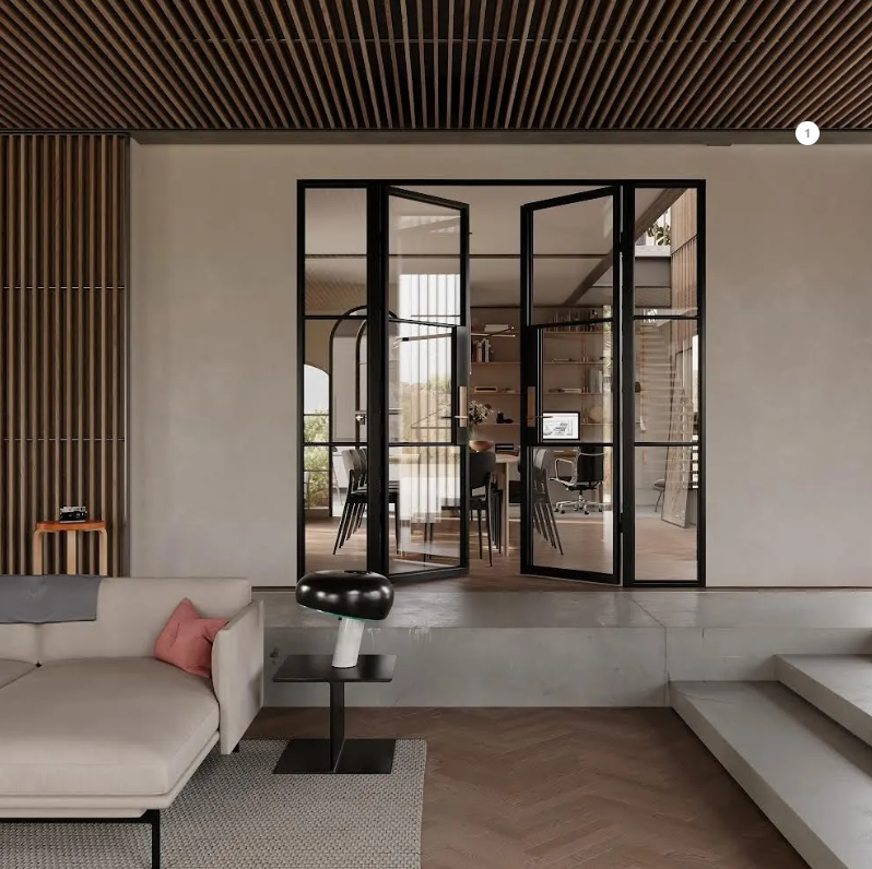 Modern living room with black-framed glass doors, neutral walls, and a beige sofa.