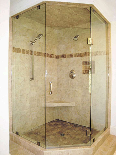 Hexagonal glass shower with beige tile walls and a built-in bench.