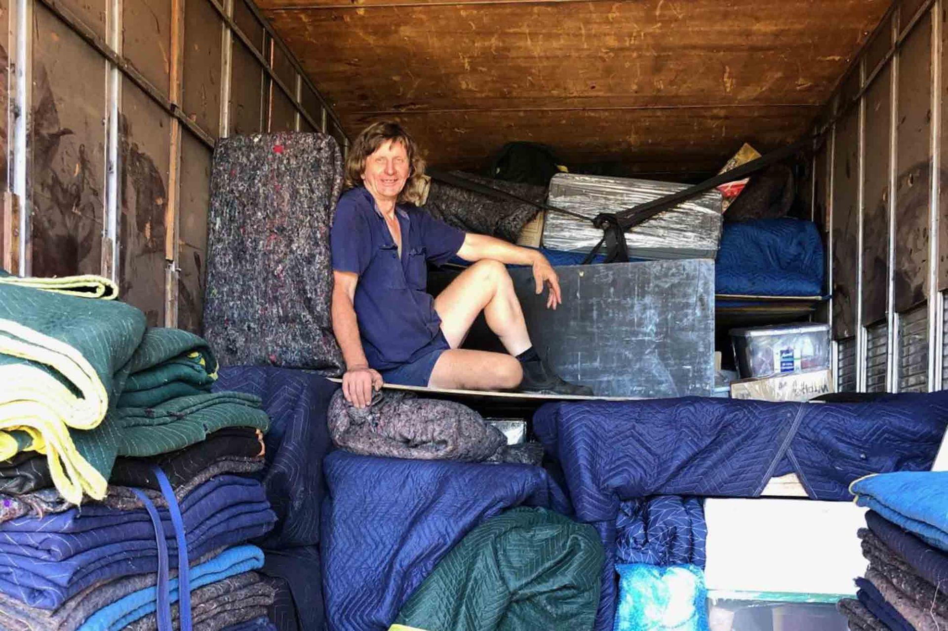Man Sitting Inside The Truck — Removalist in Toowoomba, QLD