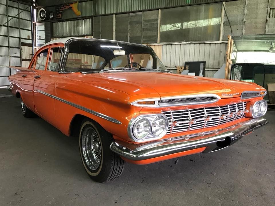 An Orange Chevrolet Impala Is Parked In A Garage — Petrena Windscreens In Oakey, QLD