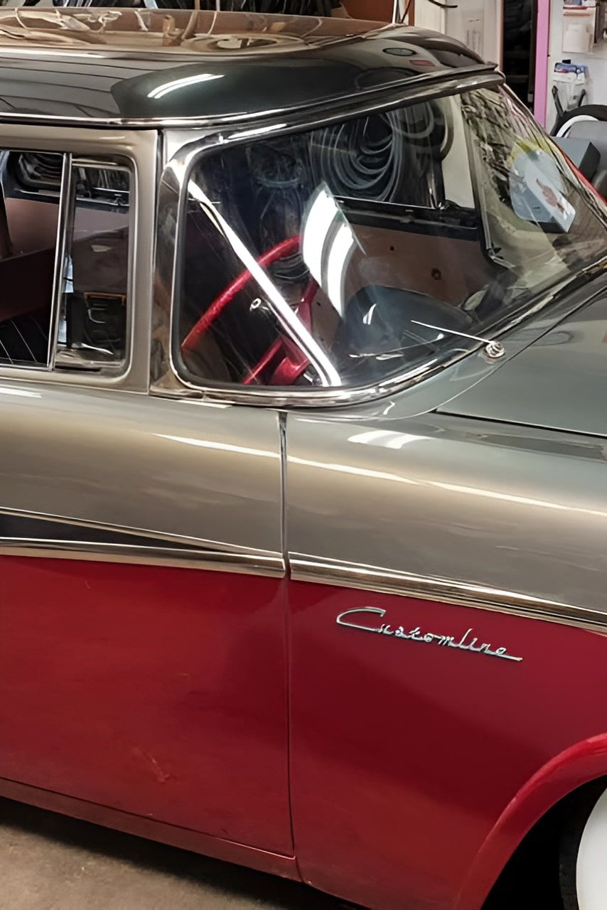 A Red And Silver Car Is Parked In A Garage — Petrena Windscreens In Leyburn, QLD