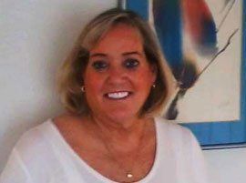 Happy Middle Aged Woman White Shirt— Kennebunk, ME — Denture Solutions