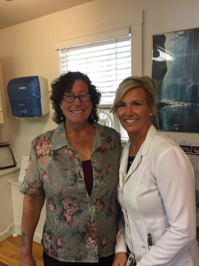 Happy Woman With Denturist — Kennebunk, ME — Denture Solutions