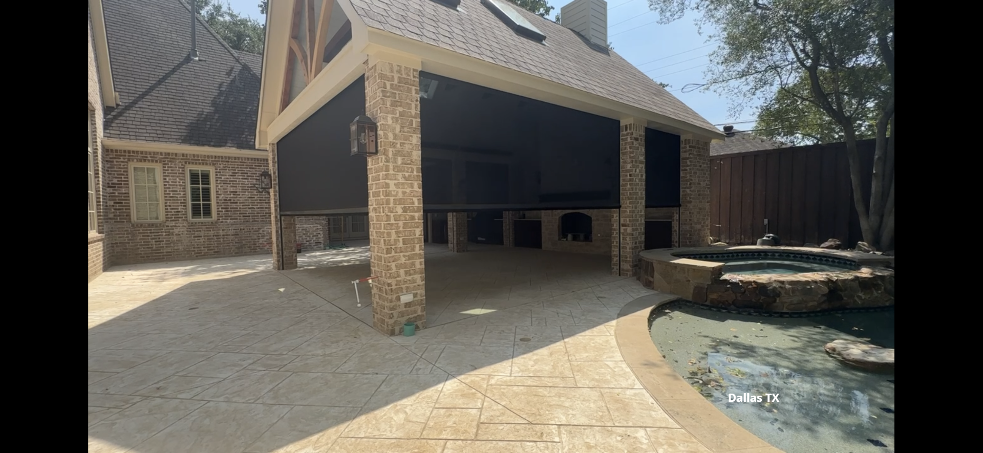 Backyard with retractable motorized patio screens