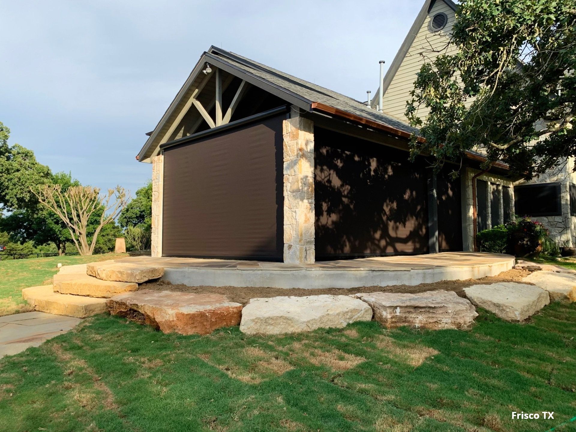 outdoor living retreat with retractable patioshade