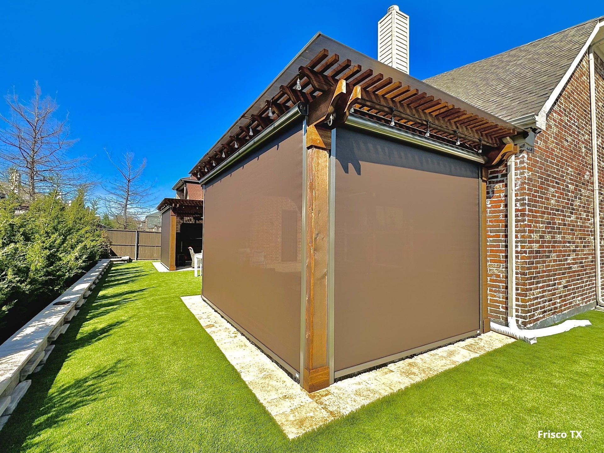 automated patio screen with landscaping