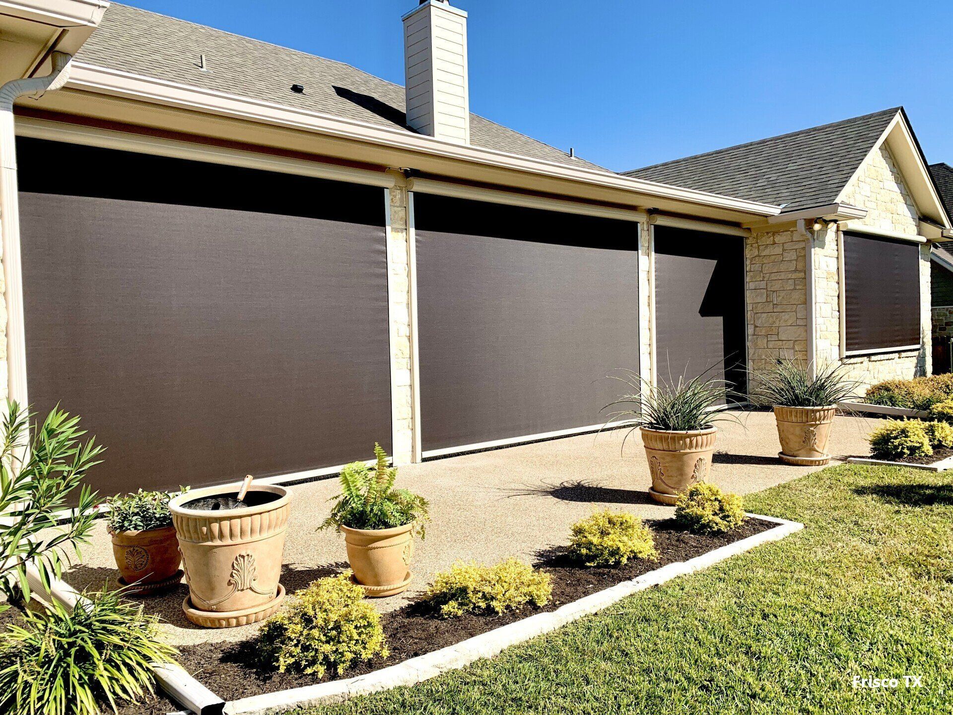 Relaxing on the back patio with an automated patio shade