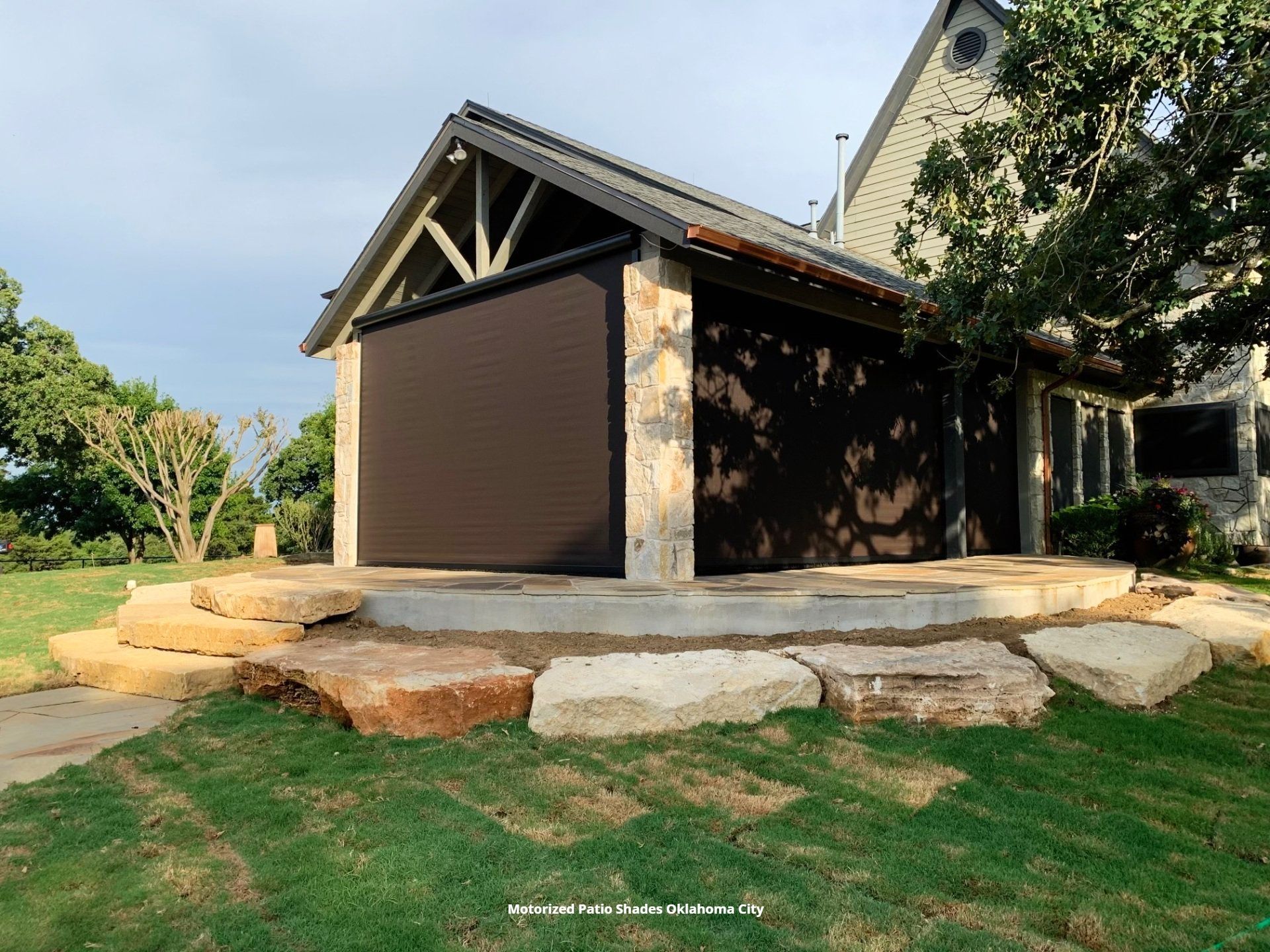 a picture of a house with motorized patio shades in oklahoma city