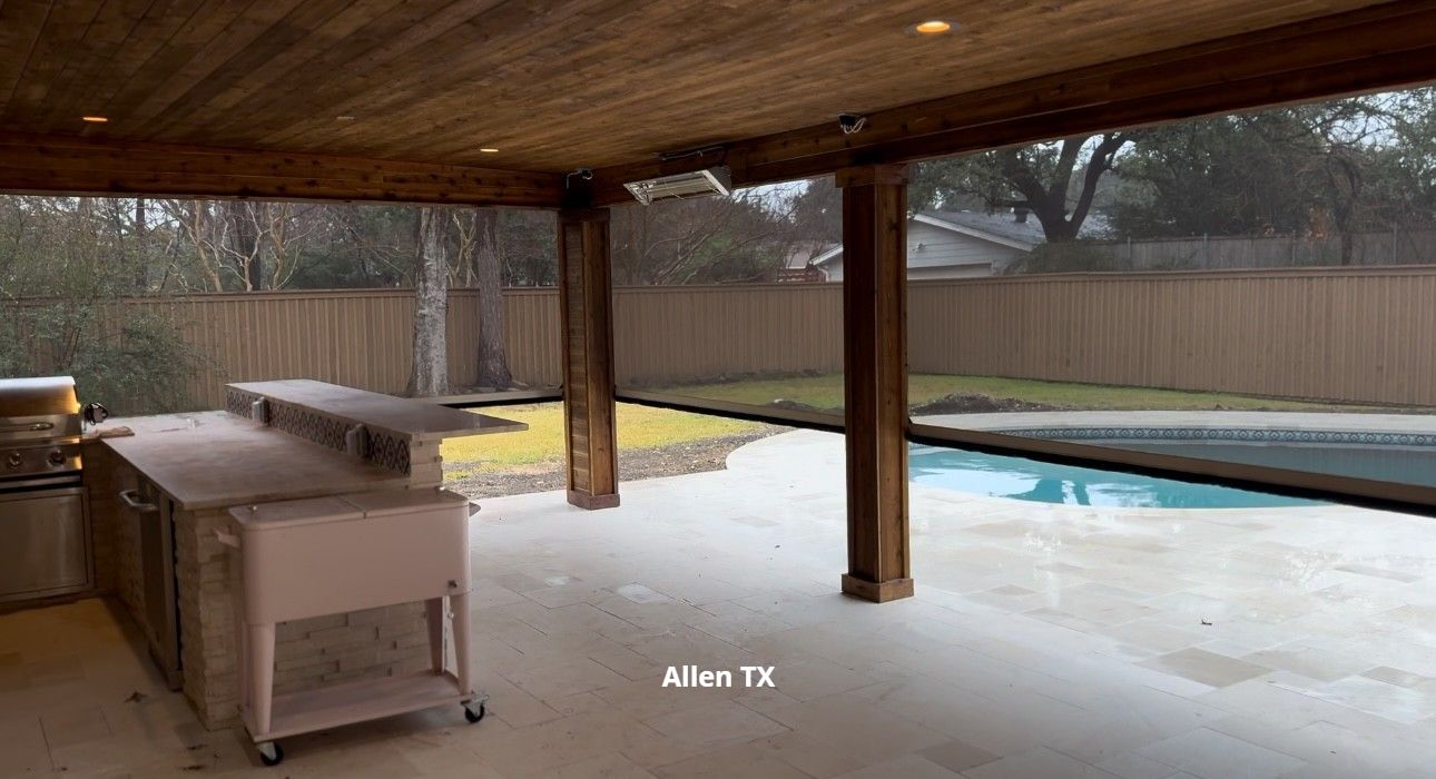 A motorized patio shade and a beautiful poolside oasis