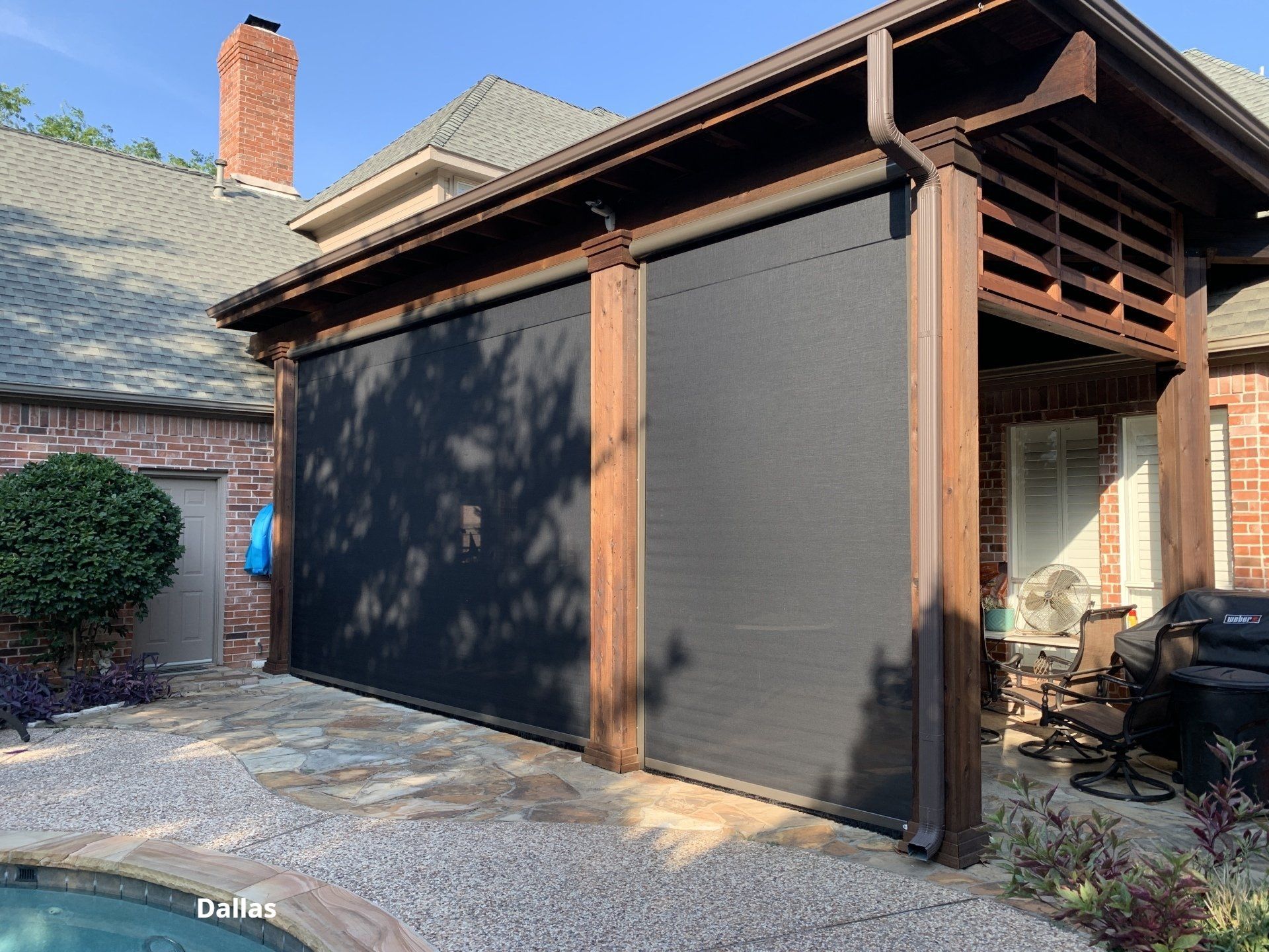 Retractable patio screen by a luxurious  deck in Dallas