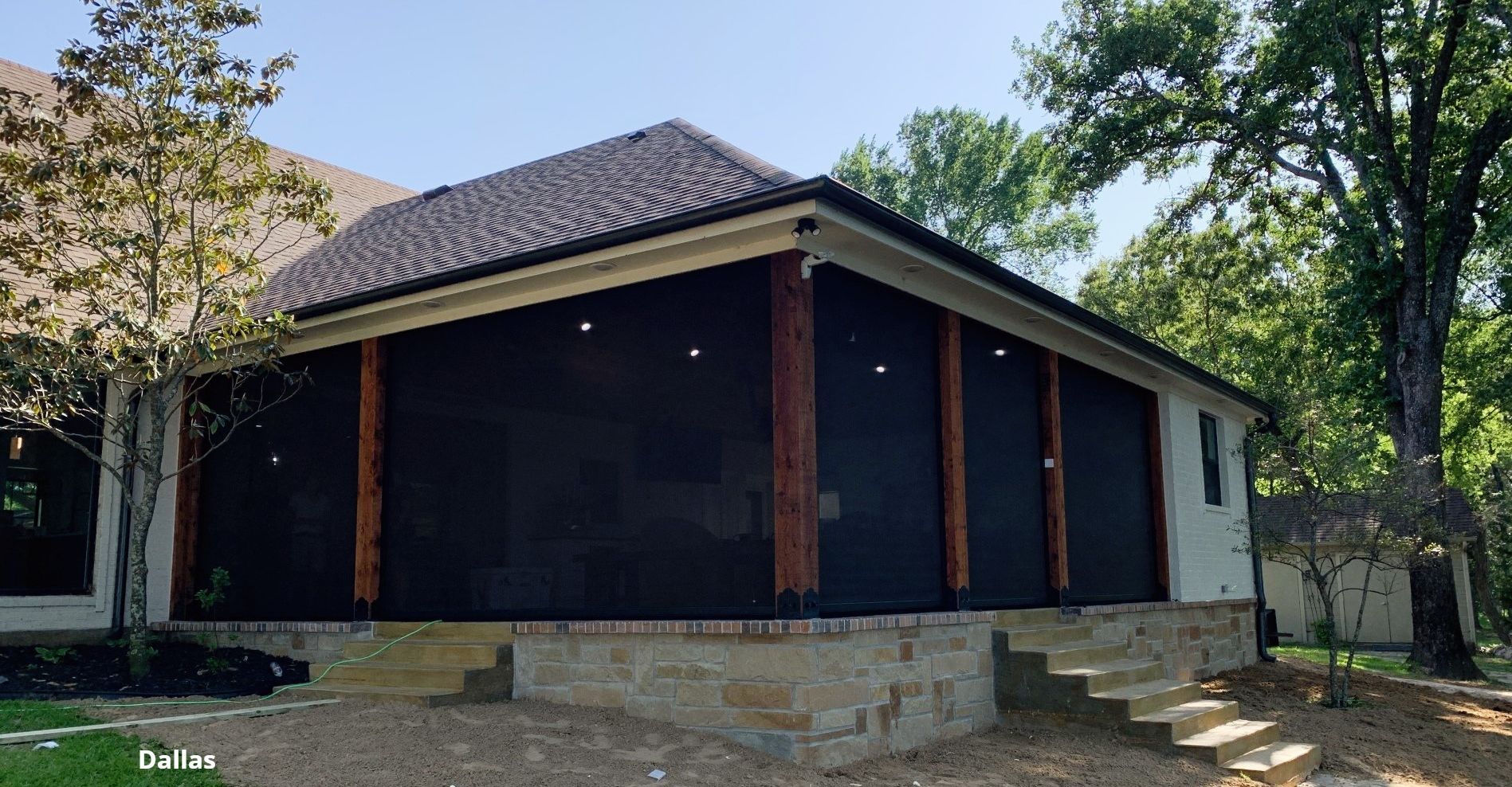 Retractable patio screens by a luxurious  deck
