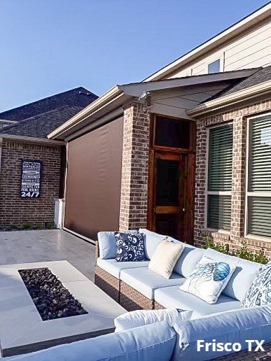 A motorized patio shade and a beautiful poolside oasis