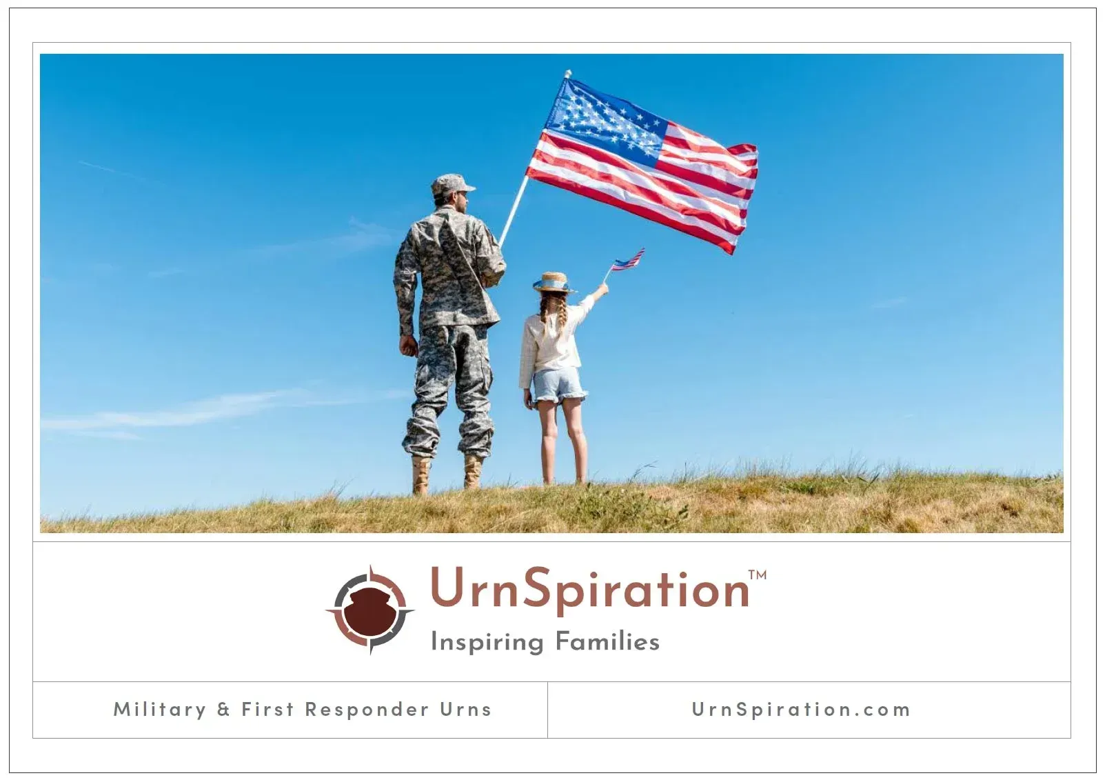 A person in military uniform and a child wave an American flag on a grassy hill against a blue sky.