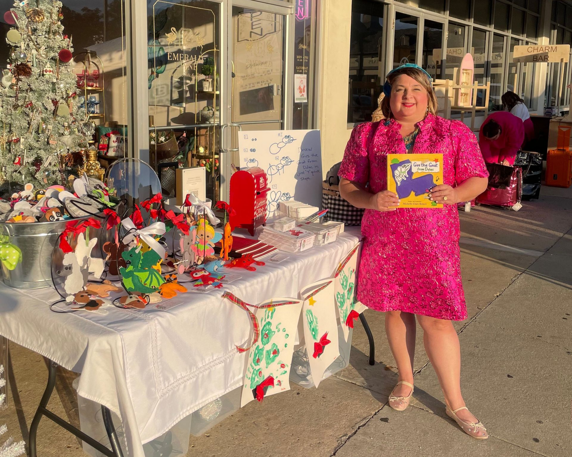 Local Author Michelle Benoit promoting her book Gus the Gnat from Dulac at a Christmat event in 2025