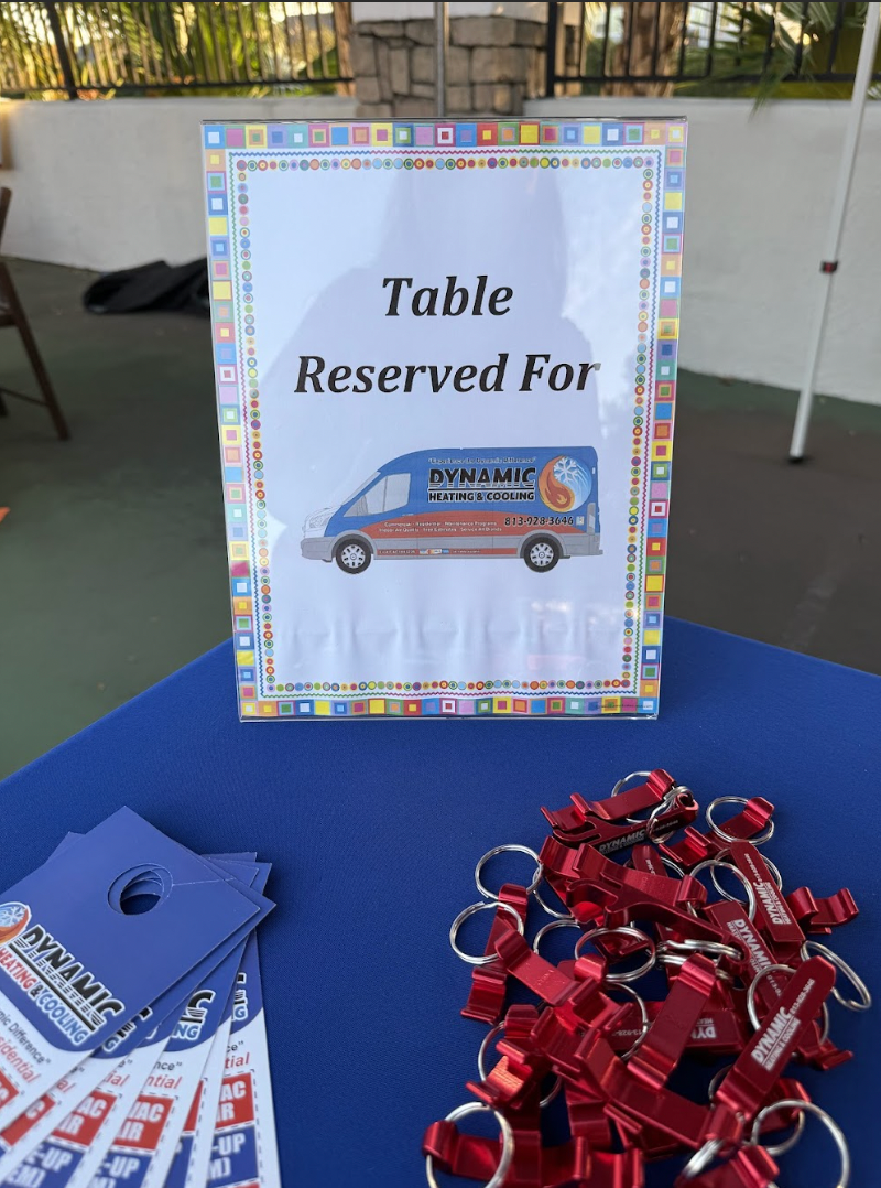 A sign on a table that says table reserved for