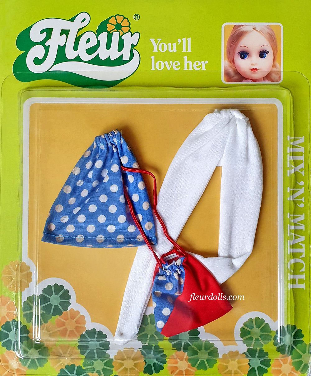 Mix N Match outfit in blister box for Fleur fashion doll with blue and white polka dot skirt, blue-red bag, and white tights.