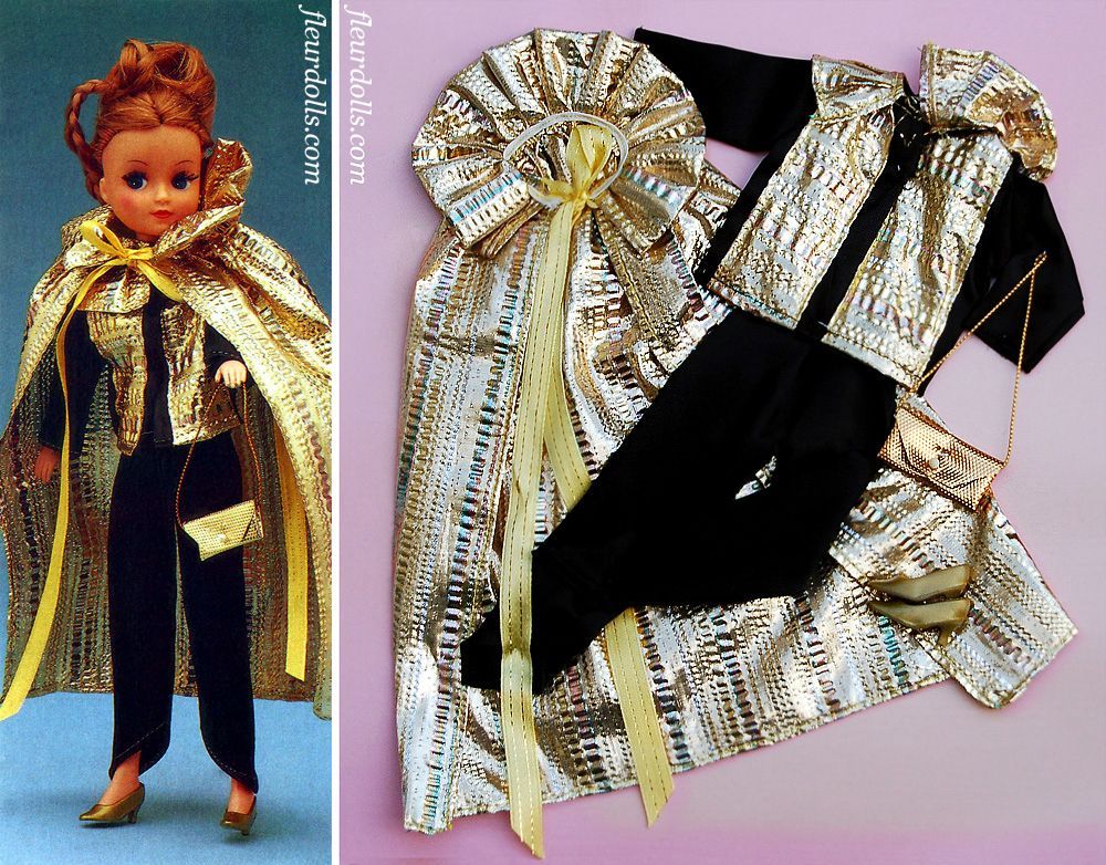 Fleur doll wearing a gold cape and black pants with gold purse and shoes Designer Fashions Otto Simon outfit 1232.