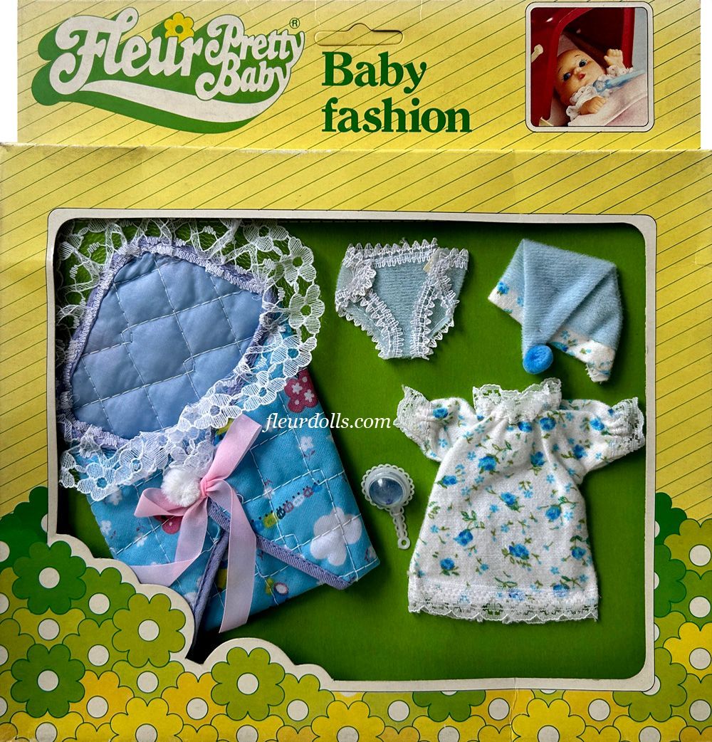 Fleur doll Pretty Baby Fashion box for a boy, with a blue quilted sleeping bag, white nightgown, blue hat and underwear.
