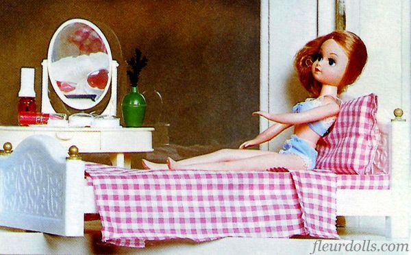 Fleur doll 1986 catalogue photo of romantic bed pink and white gingham cover and pillow