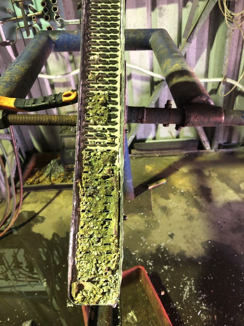 A Close up Of a Rusty Radiator in A Factory — Radiator Doctor In Pialba, QLD