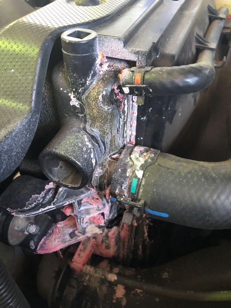 A Close up Of a Radiator with Water Coming out Of It — Radiator Doctor In Pialba, QLD