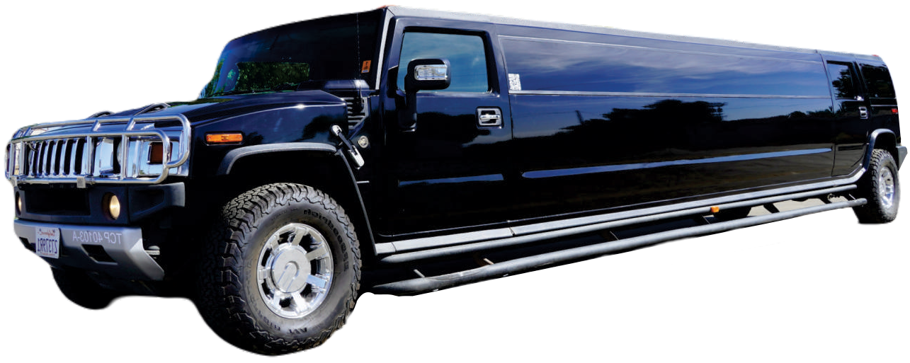 A black hummer limousine is parked on the side of the road.