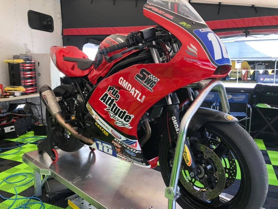 A red motorcycle with the number 1 on it