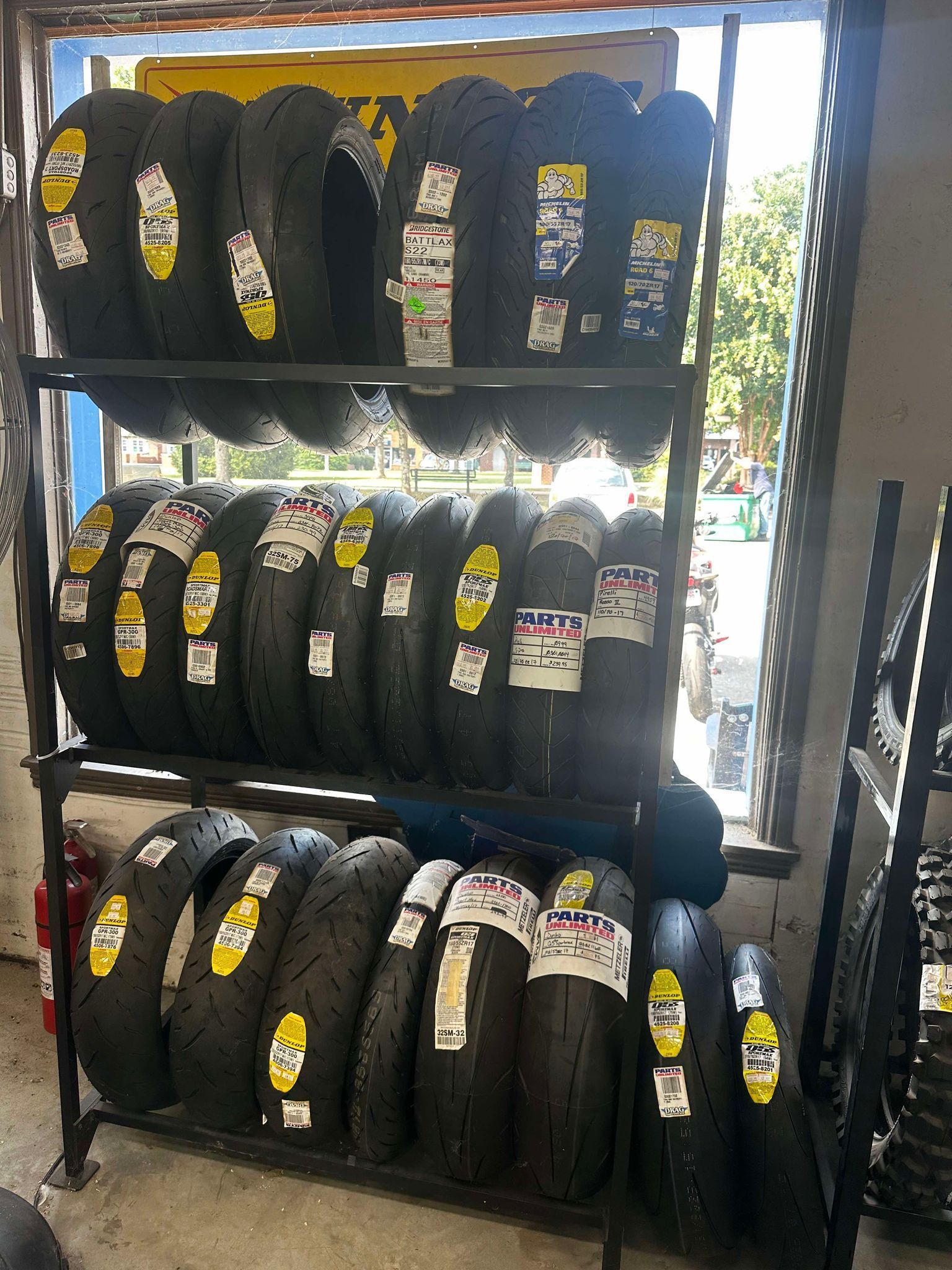 A bunch of tires are stacked on top of each other