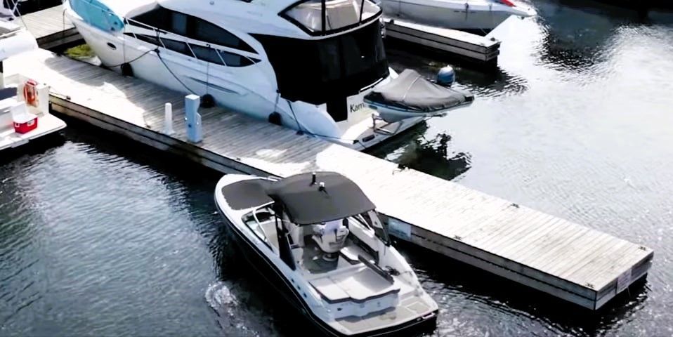 Dock safety tips for a serene marina with boats.