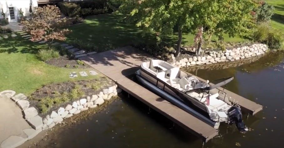 Man installing custom dock on private property