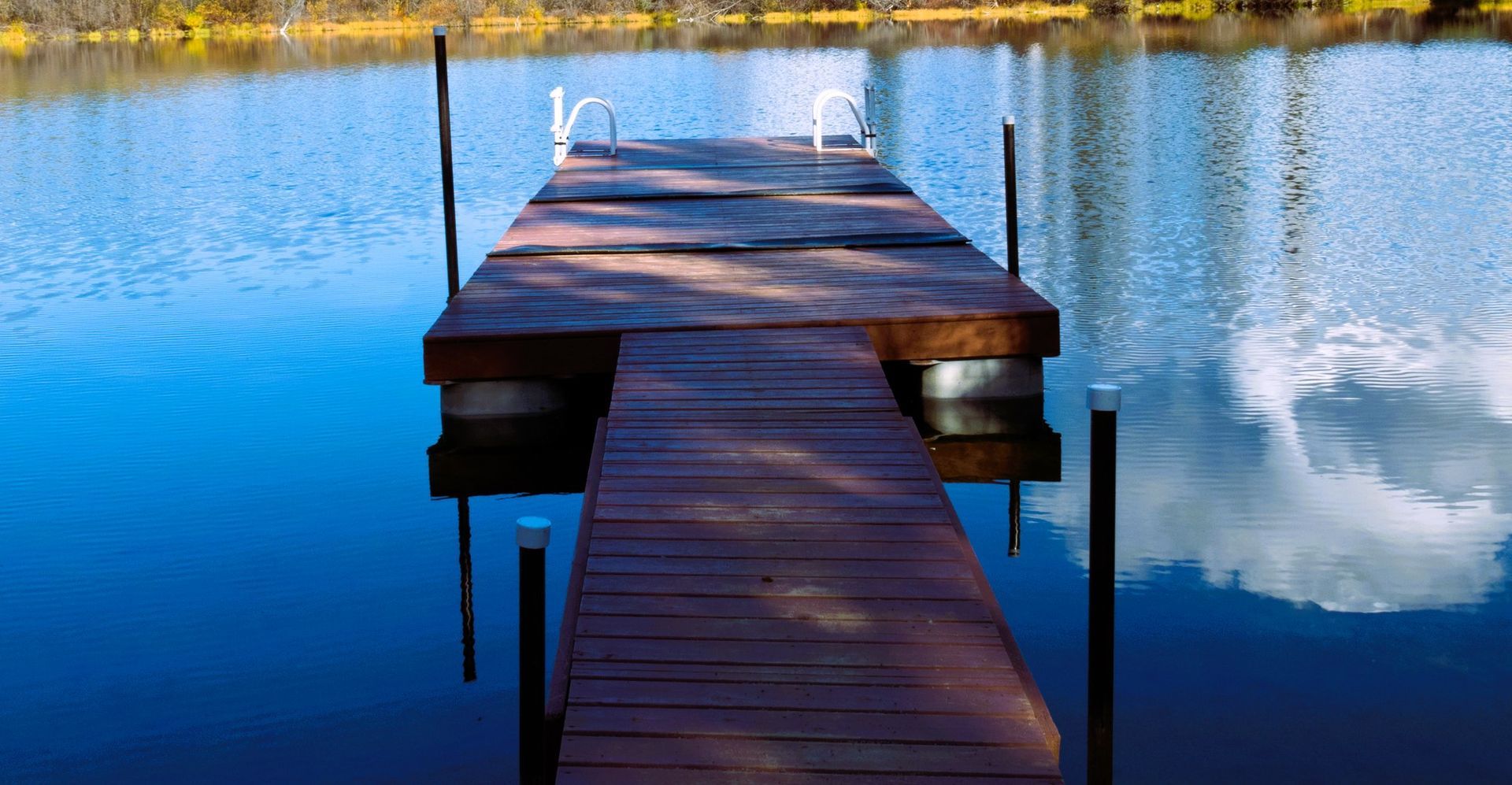Floating dock for swimming in lake.