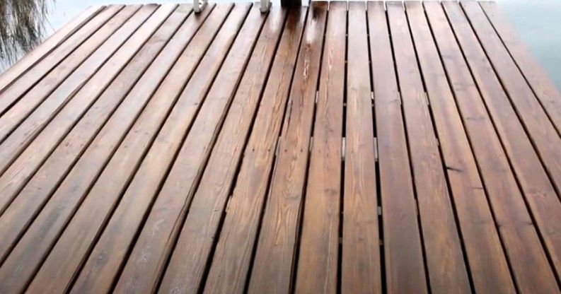 Sealed wooden dock showcasing glossy finish and weather-resistant protection